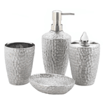 Your bathroom will shine with the hammered silver metallic finish of these luxe bath accessories. You'll love the chic look of the included pump, toothbrush holder, soap dish and cup.