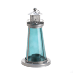 This beacon will shine with blue glow when you light a candle of your choice inside. The tinted blue glass of this nautical lantern creates a seaside ambiance that is topped off by its shining metal watchtower frame. Set this lovely lantern on your tabletop or hang it from the loop on top.