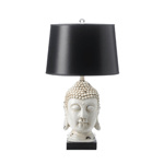 Create your own oasis with the Laos Buddha Table Lamp. Perfect for adding a touch of Zen to your everyday space. • Buddha head base in a rustic white finish. Black paper lamp shade. Clear acrylic lamp finial.