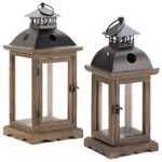 Either hanging or stationary, this candle lantern casts gorgeous light on any table spread and provides a warm glow on brisk nights. Its decorative metal top and carved wood base lend an antique flair to any home.