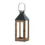 Rich wood and black metal mix and mingle to create a stunning candle lantern that makes a big style statement. The clear glass panels let the light from your favorite candle shine bright, and the stainless steel hanging loop is both fashionable and functional.