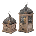 Here's a new twist on a classic lantern! Release the clasp and lift the top of this lantern to place the candle of your choice inside. The wooden frame has a little drawer and the intricate cutouts on the metalwork will dazzle you when candlelight dances through them.