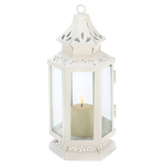 Floral metal cutouts, six glass panels, and a rustic flair makes this Victorian style lantern a statement antique piece in any home, patio, party, or wedding.