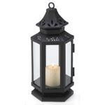 Relive the romantic days of stagecoach travel, when candle lanterns blazed brightly through the night. A nostalgic bit of Old West decor, prettied up with floral cutwork details. Large or Small.