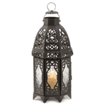 This lantern is a beautiful housewarming gift or personal décor that lights up any space. Glass panel is easily opened to allow for new candles or LED lights to be placed inside and casts a flickering glow on summer and winter events alike.