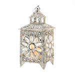 Live like royalty! Enjoy the sparkle of all the riches in the kingdom that are gathered in this stunning tabletop candle lantern. Faceted jewels set inside luxurious silver-tone filigree dazzle when a candle of your choice is lit inside. There’s nothing common about this enchanting treasure!