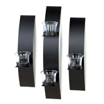 Black metal, clear glass, and sparkling candlelight mix to make a stunning accent for your wall. Two sconces hold a single candle cup, and the third holds two candle cups.