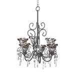 The bewitching hour can last throughout the evening with radiant blooms that shimmer with candlelight. This intriguing candle chandelier mixes curls of black metal, six twilight-kissed glass candle cups, and a bevy of faceted dangling crystals that capture the light. 