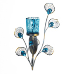 Your room will sparkle with gorgeous candlelight when you light a candle inside this stunning wall sconce. The peacock inspired design of the turquoise candle cup and the metallic plumes with faceted turquoise jewels will delight you day and night.