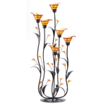 Slender curving stems support iridescent amber lily blossoms, creating an elegant play of form and color. Place a candle into each bloom to enhance the night with dazzling light!