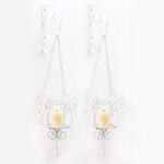 Turn your empty wall space into a bewitching display of light! Free-swinging sconce pendants gracefully cradle glowing votive candles for a fascinating display of classic artistry.