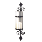 A palatial touch of Tuscan elegance adds old-world beauty to your home! Ornate matte-black forms a dramatic backdrop for a crystal-clear column of glass. Simply add your favorite color pillar candle for instant decorating magic!