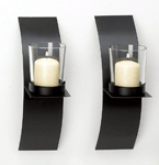 Add a chic, modernistic look to any room with this striking pair of candle sconces! 