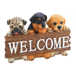 Welcome friends and family to your home with eternally cute puppy dog faces! This charming wall plaque features three little pups holding a wood-style sign decorated with the word Welcome. 