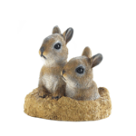 Two curious bunnies have popped into your yard to see what's going on! This fun little outdoor accent piece features a mound of dirt with two tiny bunnies peeking out. It will make you smile each time you see it in your garden or yard. 