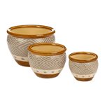 Decorate your patio or garden with this set of three ceramic planters. Each planter features a mixture of earth-tone shades to compliment and accent your greenery. This super value set includes three pots in varied sizes, all with a matching abstract motif. The bottom of the planter features a small drain hole to ensure your plant stays happy and healthy.