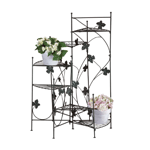 Airy strands of ivy grace this staircase style plant stand. Six shelves place plants at graduating heights, creating a dramatic display of greenery!