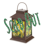 When lit from within, the stained glass panels of this stylish lantern come alive with jewel-like colors, turning captured sunlight into a mesmerizing display. No candles or electricity required; solar-power cells in the lid recharge automatically when outdoors! 