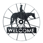 Welcome your guests into your home with this Western-inspired sign. Made from black iron, this ranch-ready wall decor features a wagon wheel design, silhouettes of a cowboy upon his trusty steed, and the word “welcome” in the grass below the horse’s hooves.