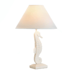 Every room needs two things: beautiful lighting and a touch of whimsy. You'll get both with this lovely polyresin table lamp! The base is shaped like a charming white seahorse topped with a neutral fabric shade that will fit right into any decor. 