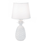 This is the brightest, whitest pineapple you'll ever see! This fun little table lamp features a white pineapple base topped with a white fabric shade that is sure to brighten up any room of your home. 